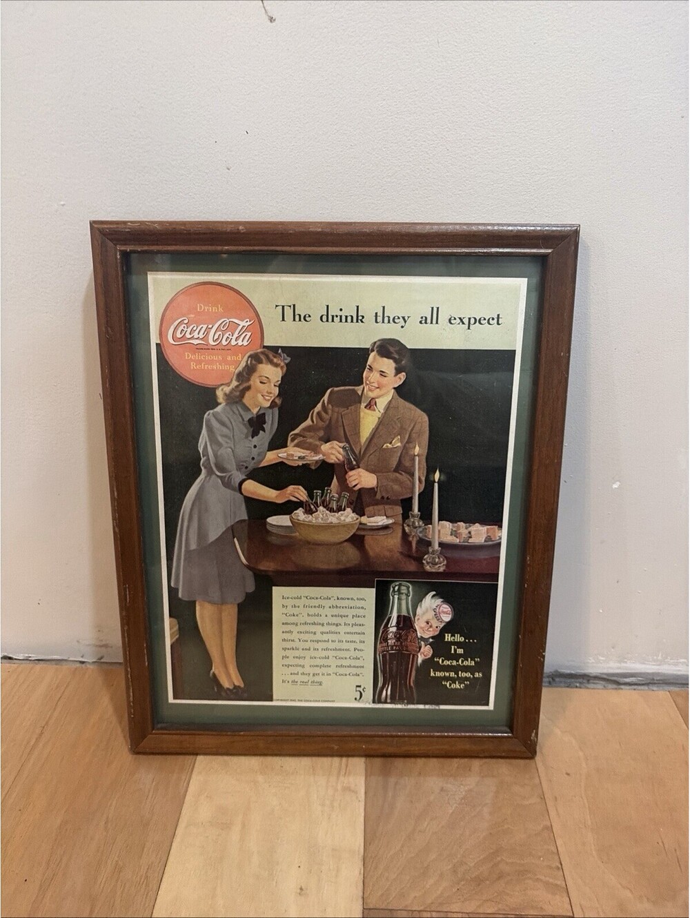 Vintage Coca Cola “The drink they all expect” 1942 Print Advertisement In Frame